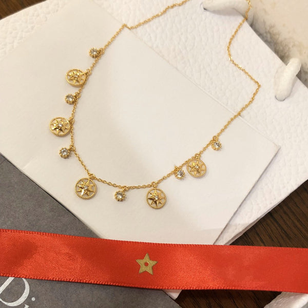 COLLANA ROSE DES VENTS ORO GIALLO, DIAMANTI E MADREPERLA