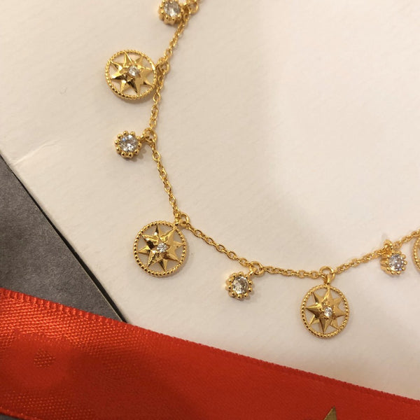 COLLANA ROSE DES VENTS ORO GIALLO, DIAMANTI E MADREPERLA