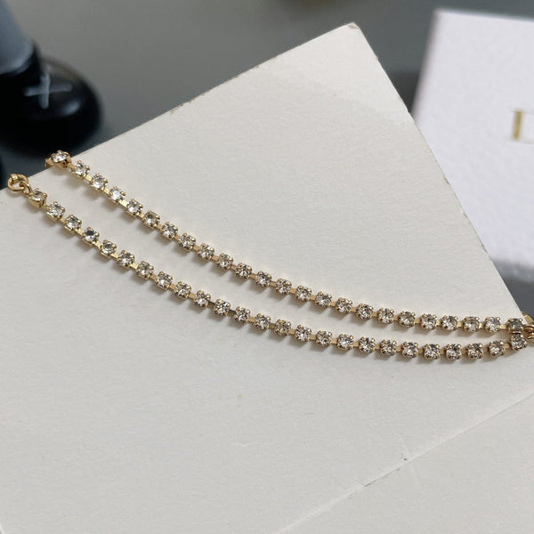 Collana con catena CD e diamanti