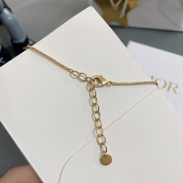 Collana con catena CD e diamanti