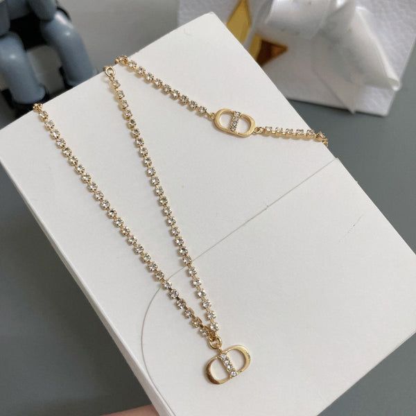 Collana con catena CD e diamanti