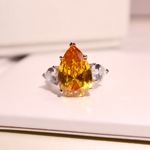 ANELLO PROMISE A FORMA DI PERA IN ARGENTO GIALLO CON DIAMANTI