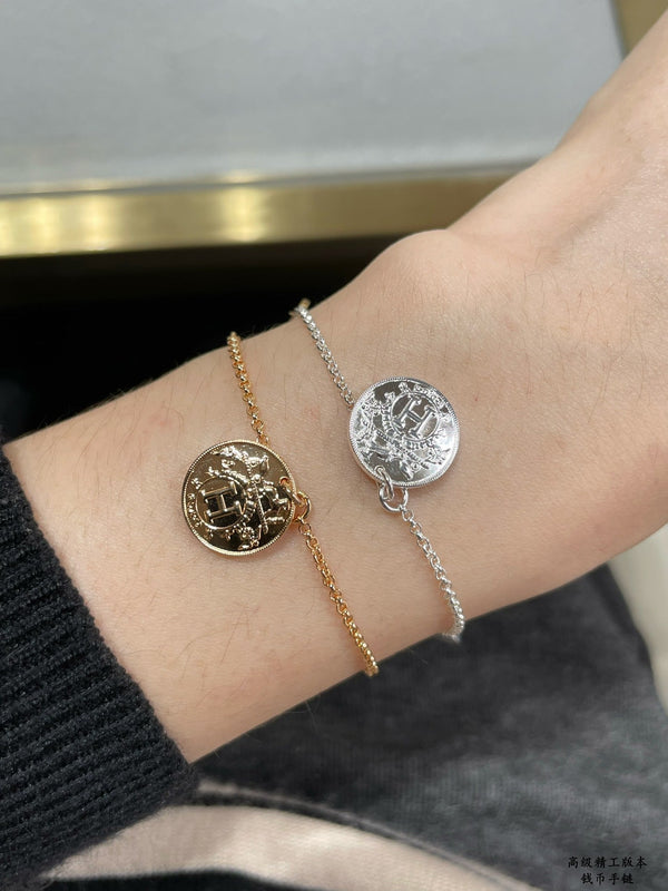 BRACCIALE CON MONETE HM