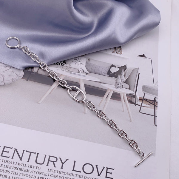 BRACCIALE CON LETTERA H OVALE IN ARGENTO CON NASO DI MAIALE