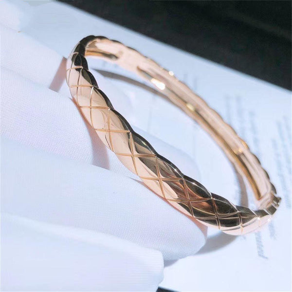 BRACCIALE CRUSH TRAPUNTATO IN ORO ROSA