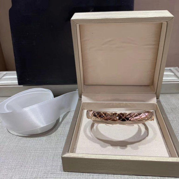 BRACCIALE CRUSH TRAPUNTATO IN ORO ROSA
