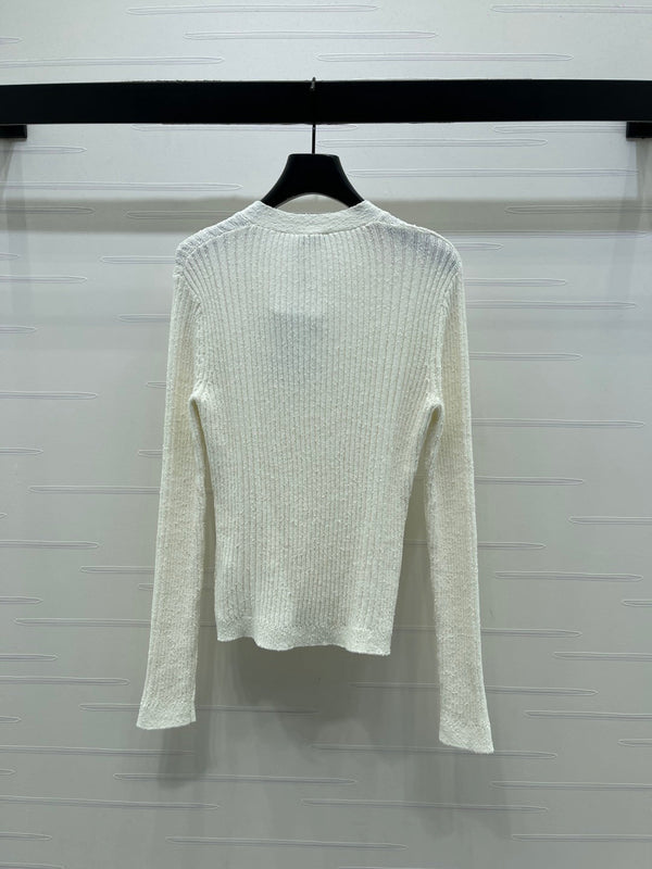 Cardigan en maille col V Chanel 2026 en viscose de laine blanche et noire
