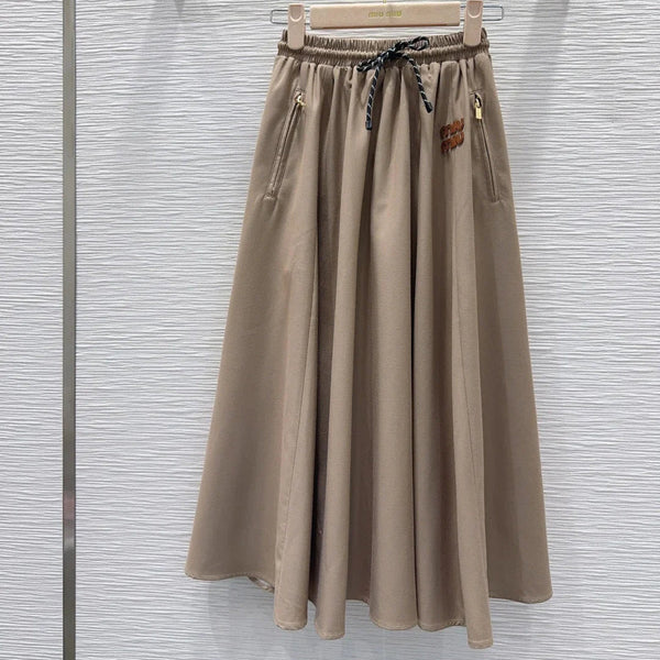 Jupe midi Miumiu 2026 en polyester noir et beige