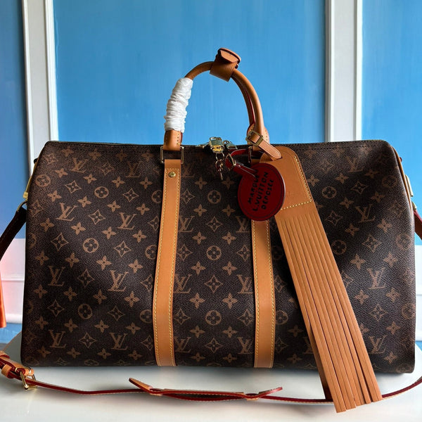 KEEPALL 50 BANDOULIERE MONOGRAM DUST COASTED CANVAS 