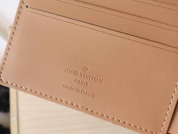 Portafoglio multiplo LV Monogram in pelle di mucca Taurillon granata