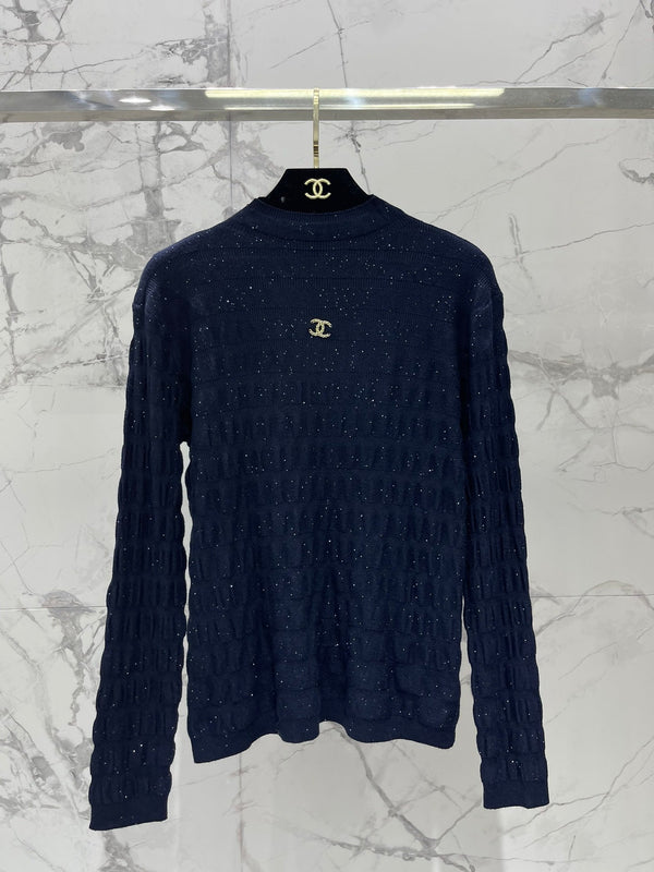 Pull col roulé en laine Chanel 2025