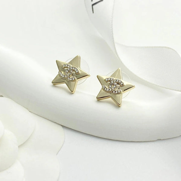 Boucles d'oreilles étoiles Double C Or clair CC