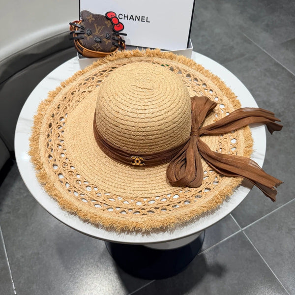 Chapeau de soleil en raphia Chanel avec ruban en soie 219110