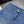 Jean droit Chanel 2026 avec logo double C et ornements en strass