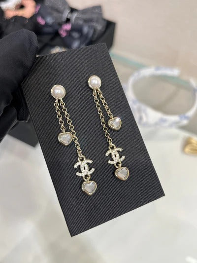 Boucles d'oreilles longues CC Or clair diamant complet double C cœur diamant cristal