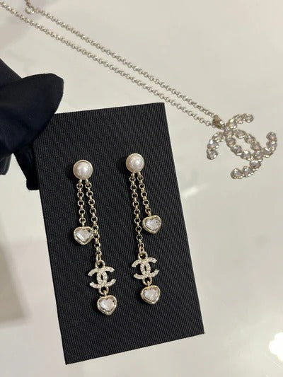 Boucles d'oreilles longues CC Or clair diamant complet double C cœur diamant cristal
