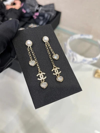 Boucles d'oreilles longues CC Or clair diamant complet double C cœur diamant cristal