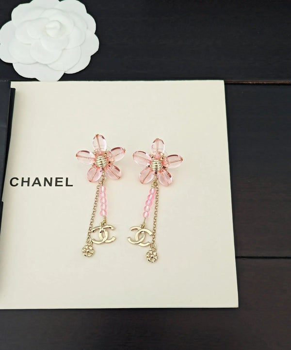 Boucles d'oreilles dorées à pampilles et perles d'olivier roses CC Double C