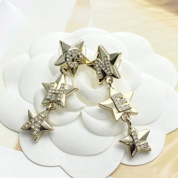 Boucles d'oreilles CC Double C 3 étoiles or clair