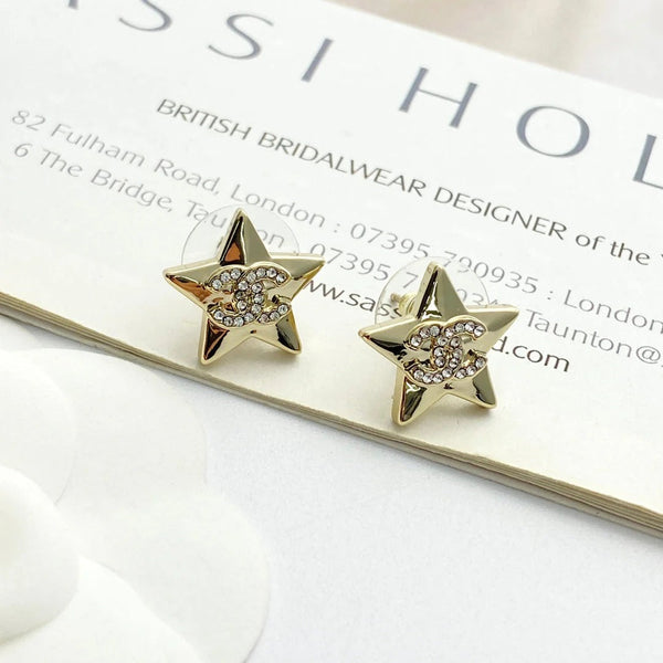 Boucles d'oreilles étoiles Double C Or clair CC
