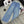 Jean droit Chanel 2026 avec logo double C et ornements en strass