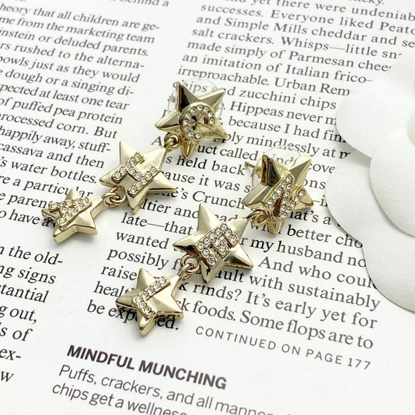 Boucles d'oreilles CC Double C 3 étoiles or clair
