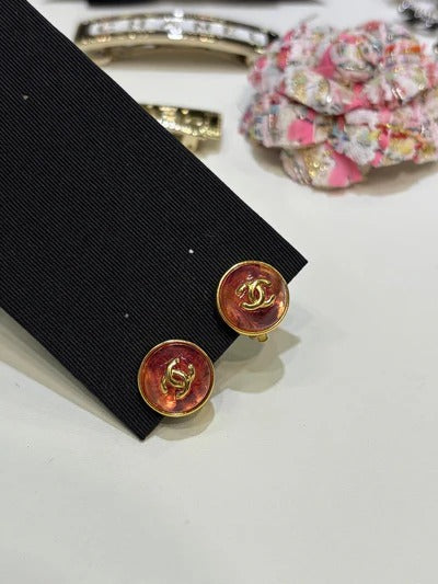 Chanel Gripoix Earrings With Gold CC Logo And Red Glass Stones