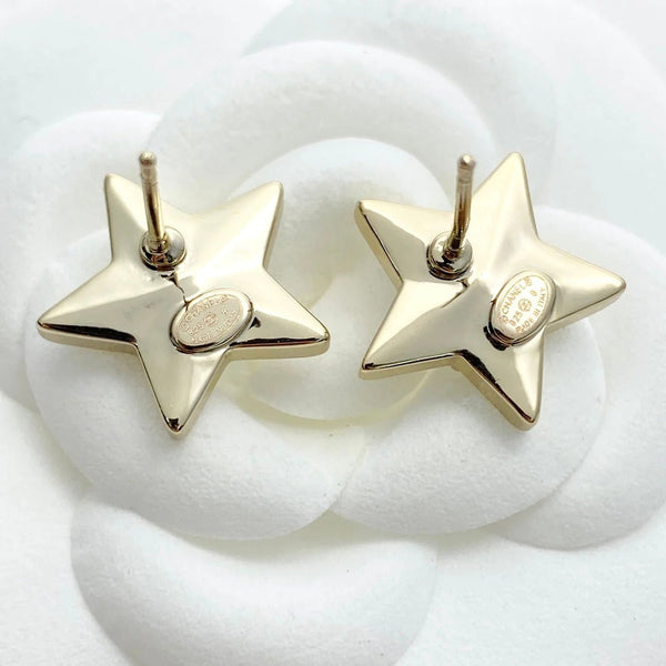 Boucles d'oreilles étoiles Double C Or clair CC