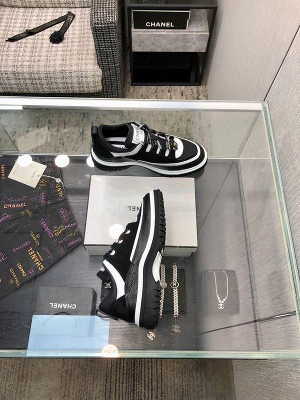 SCARPE CASUAL BASSE IN PELLE DI AGNELLO E CAMOSCIO NERO E BIANCO