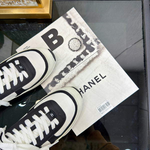 Chanel 2025 Sneaker Black and White Cowhite & Suede 507456