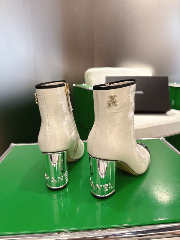Chanel 2025𝐒𝐒 High Heeled Ankle Boots Cream and Black Glossy Leather 507546
