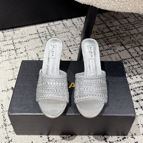 ALAIA Muller, décolleté in pelle intrecciata color argento metallizzato con tacco alto