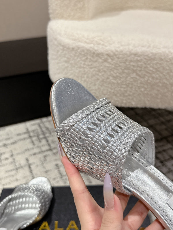 ALAIA Muller, décolleté in pelle intrecciata color argento metallizzato con tacco alto