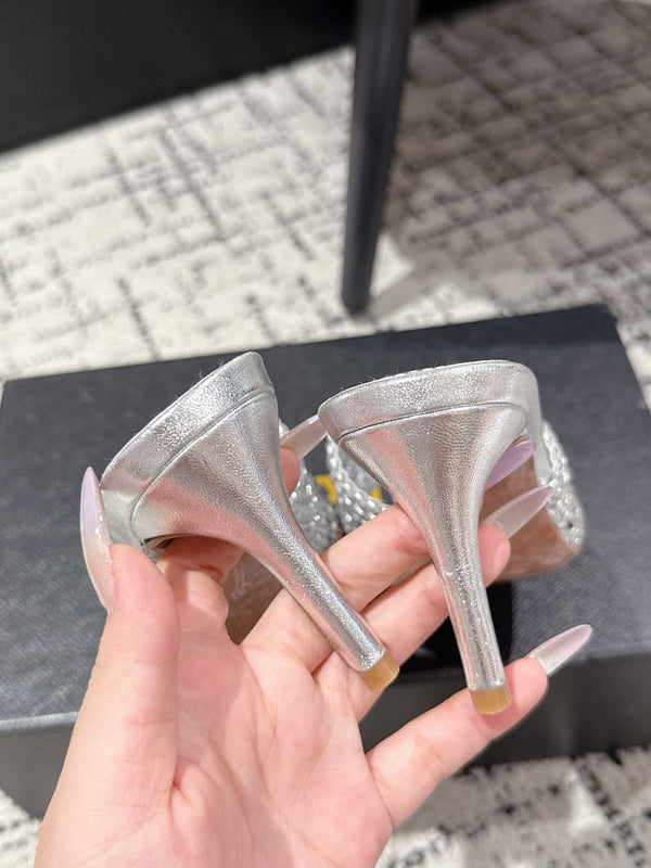 ALAIA Muller, décolleté in pelle intrecciata color argento metallizzato con tacco alto