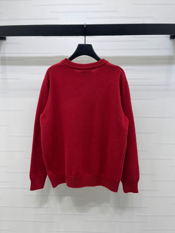 Pull rouge en maille Chanel à motifs floraux brodés 340997
