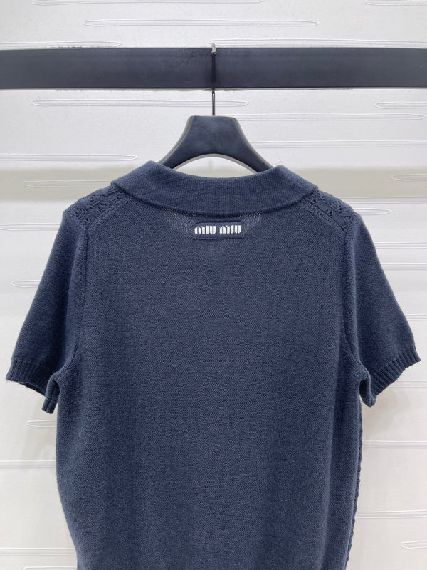 Haut Miu Polo semi-ouvert à manches courtes en maille bleu marine 343436