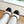 CC 25 Short Boot White Calfskin Black Bow 430317