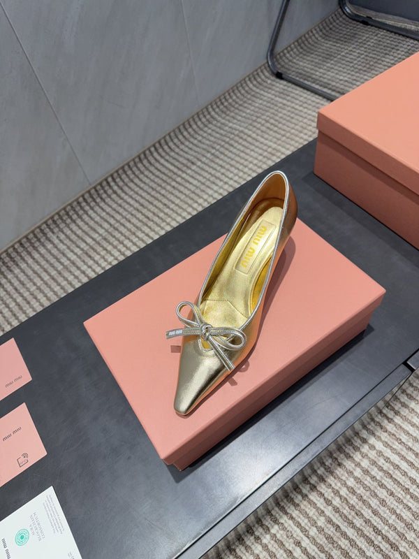 Miu 26s Pointed Toe Pumps 55mm In Gold Calfskin With Bow