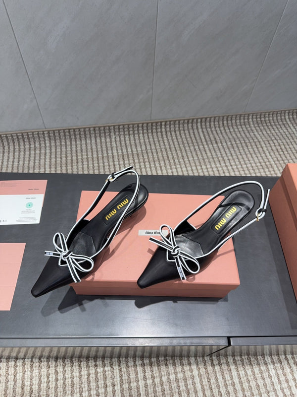 Miu 26s Slingback 55mm In Black White Calfskin With Bow