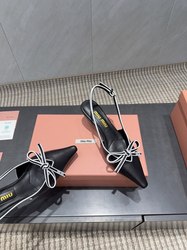 Miu 26s Slingback 55mm In Black White Calfskin With Bow