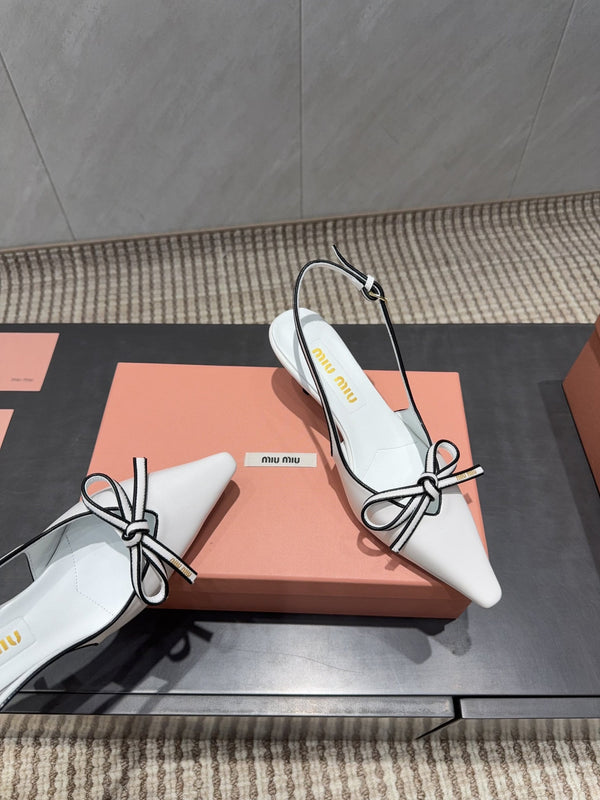 Miu 26s Slingback 55mm In White And Black Calfskin With Bow