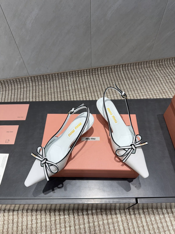 Miu 26s Slingback 55mm In White And Black Calfskin With Bow