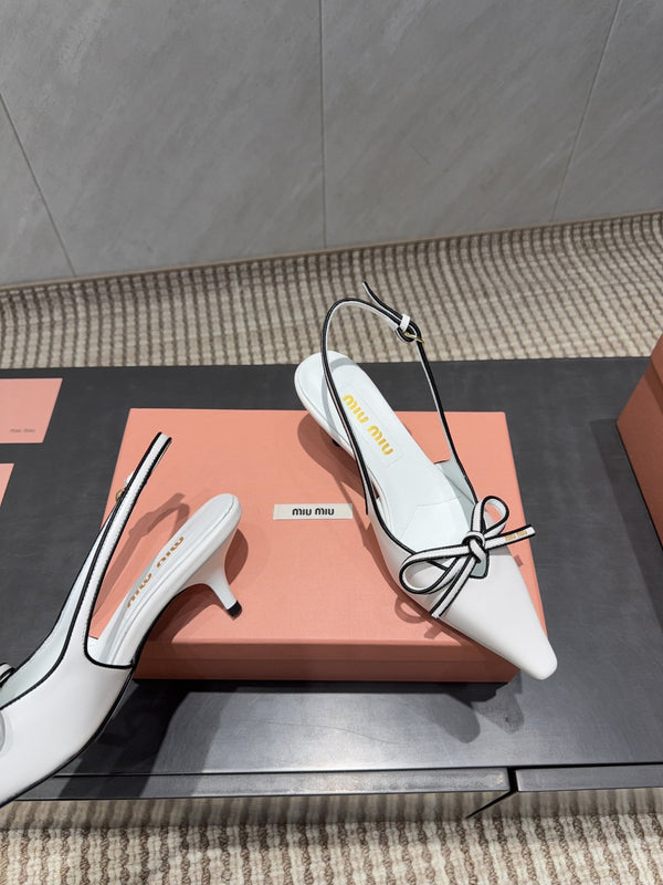 Miu 26s Slingback 55mm In White And Black Calfskin With Bow