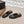 CC 26s Ballerines bout rond à dos ouvert Tissu noir Cuir 613254
