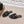 Sandales plates CC 26s en paille noire et cuir 613263