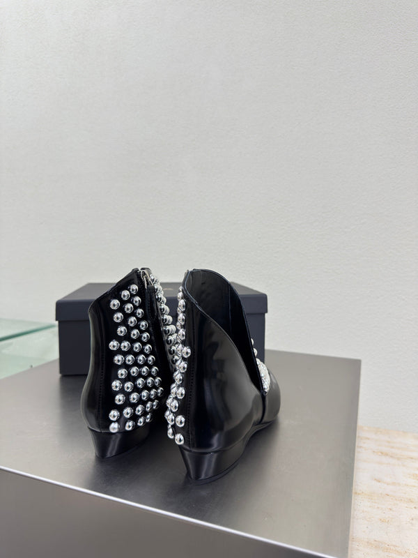 ALAIA Rivet ankle boots black cowhide leather 471093