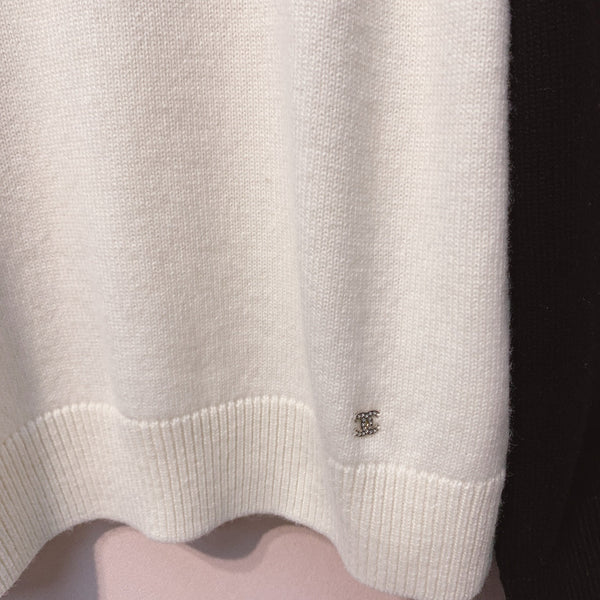 Chanel 25 Pull Nœud Noir Blanc Laine 317422