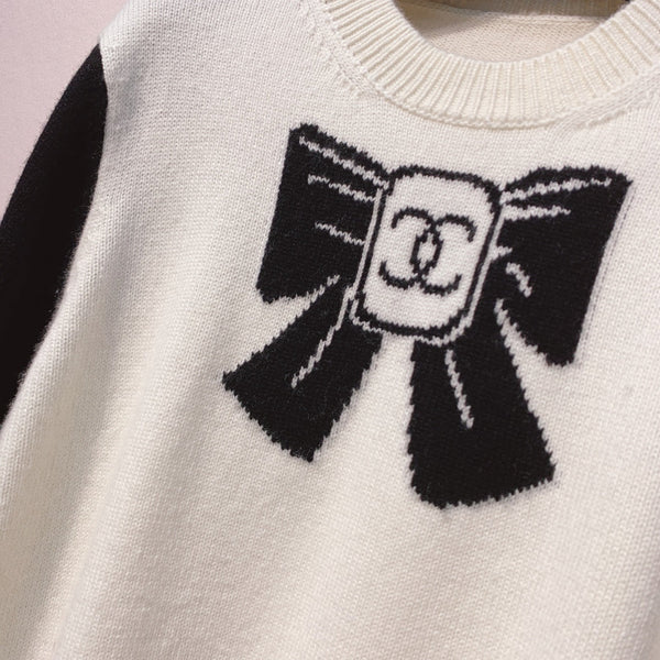 Chanel 25 Pull Nœud Noir Blanc Laine 317422