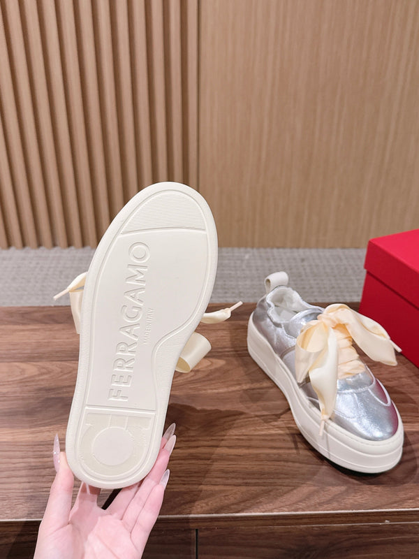 Ferragamo Bow Platform Sneaker Sliver Satin Sheepskin