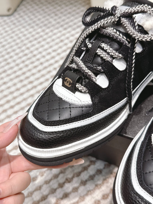 Chanel 26s Thick-Sole Sneakers In Black And White Calfskin With Fur Lining
